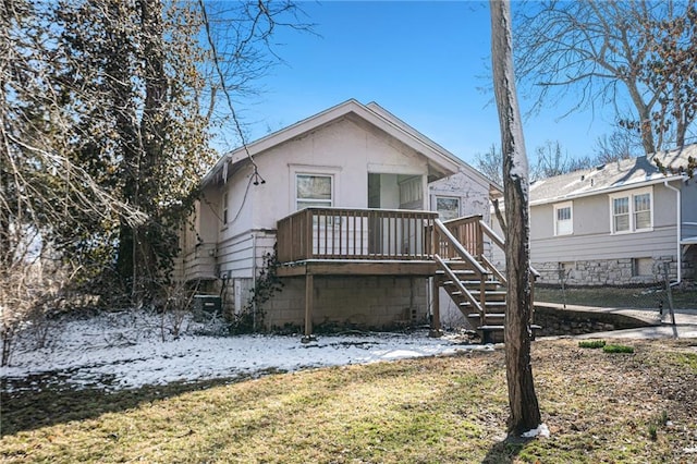 back of house with fence and stairs