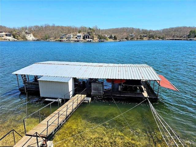 dock area featuring a water view