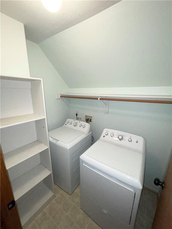 washroom with laundry area and independent washer and dryer