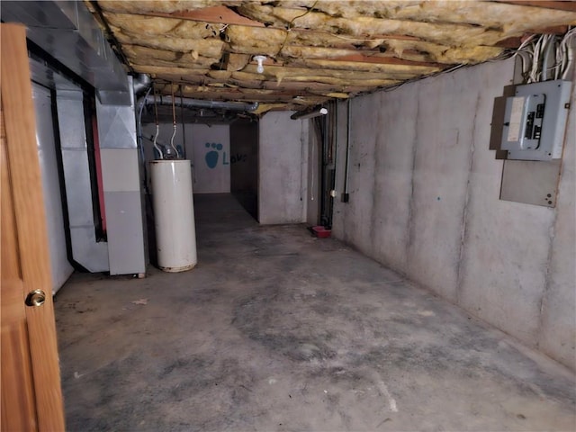 unfinished below grade area featuring gas water heater and electric panel