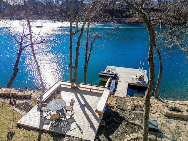 dock area with a water view