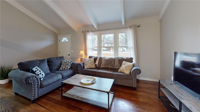 living room featuring lofted ceiling with beams, baseboards, and wood finished floors