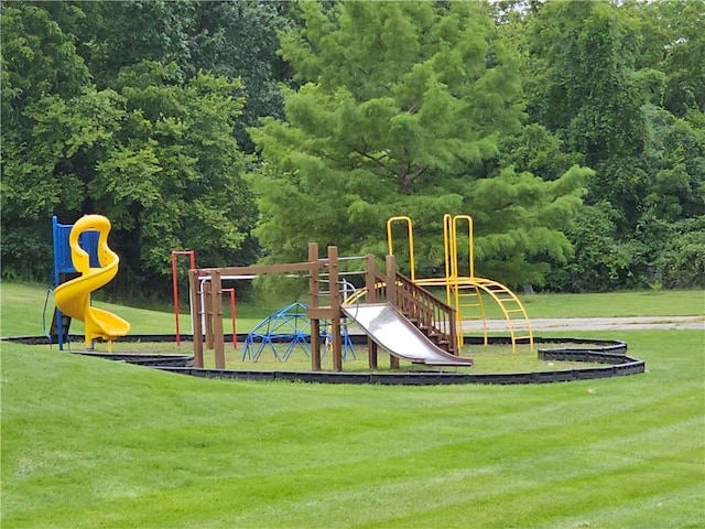 community play area with a lawn