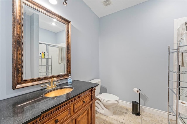 full bathroom featuring tile patterned flooring, toilet, visible vents, baseboards, and a stall shower