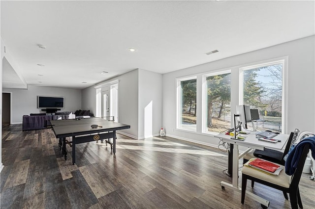 playroom with baseboards, visible vents, and wood finished floors