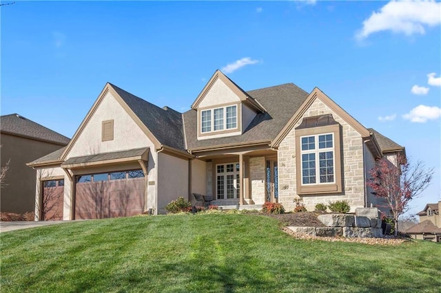 view of front of property with a front lawn, concrete driveway, an attached garage, stone siding, and stucco siding