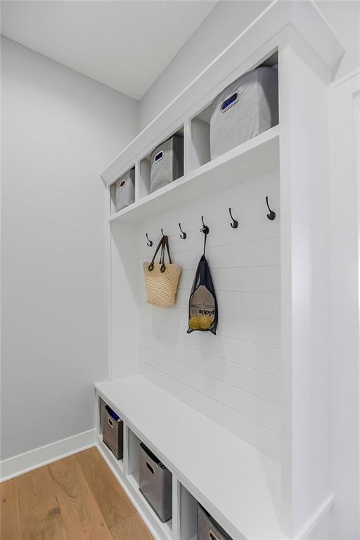 16649 S Tomashaw St, Olathe, KS 66062 - mudroom featuring baseboards and light wood-style flooring