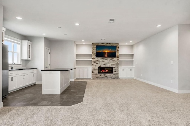 16649 S Tomashaw St, Olathe, KS 66062 - unfurnished living room with carpet flooring, visible vents, baseboards, and recessed lighting