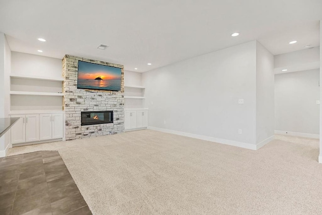 16649 S Tomashaw St, Olathe, KS 66062 - unfurnished living room with light carpet, baseboards, and recessed lighting