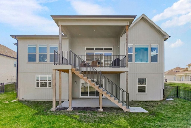 16649 S Tomashaw St, Olathe, KS 66062 - rear view of house featuring a yard, a patio area, stairway, and fence