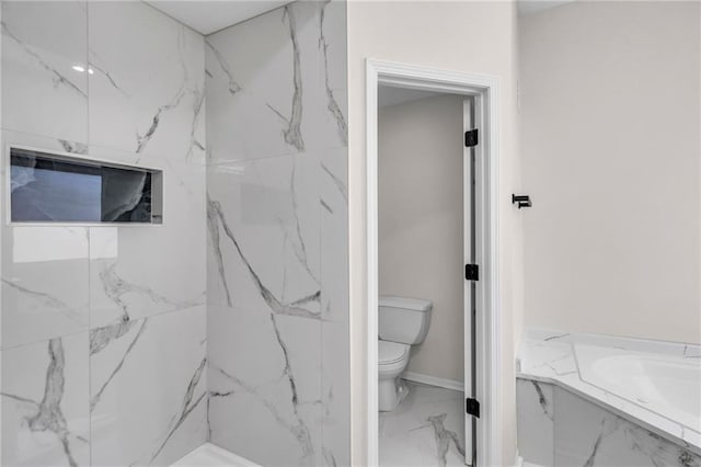 bathroom featuring toilet and marble finish floor