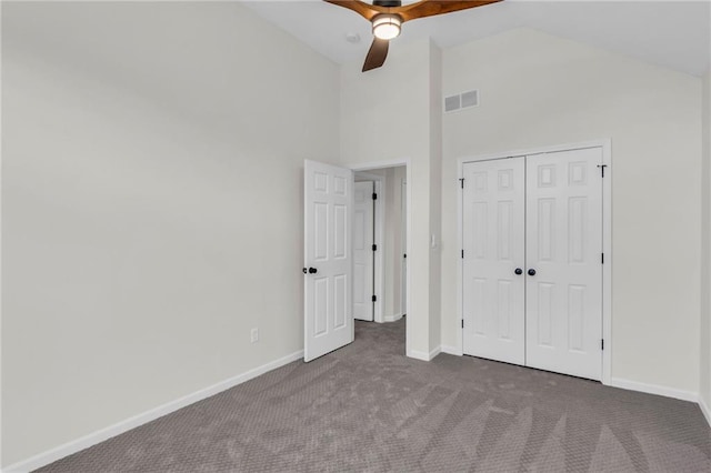 unfurnished bedroom featuring carpet, visible vents, and baseboards