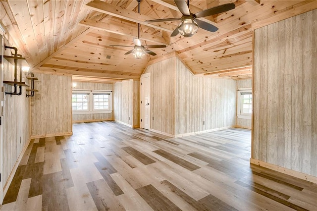 interior space featuring wood finished floors, plenty of natural light, and ceiling fan