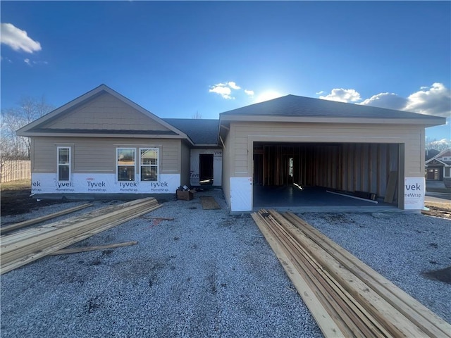 property under construction with a garage and driveway