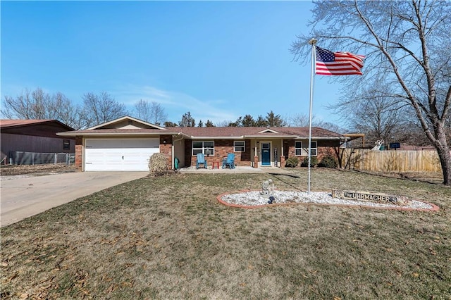 single story home with an attached garage, brick siding, fence, concrete driveway, and a front lawn