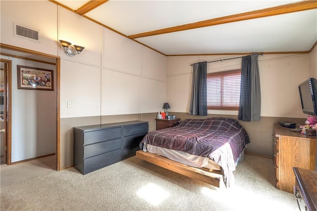 bedroom with visible vents, vaulted ceiling, and light colored carpet