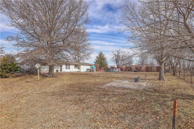 view of yard with a patio area and fence