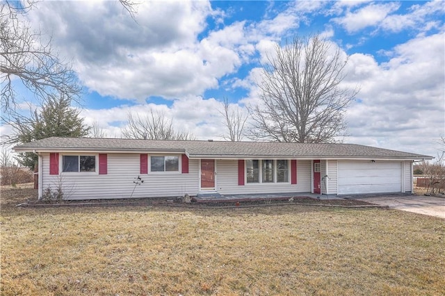 ranch-style house with a garage, driveway, and a front lawn