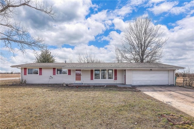 single story home featuring a garage, driveway, and a front yard