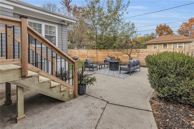 view of patio featuring fence