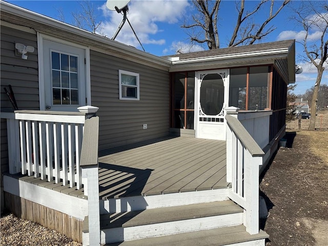 deck with a sunroom