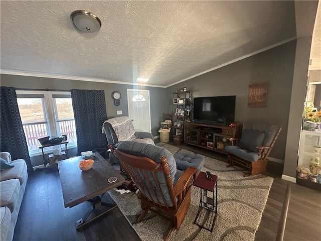 living room with crown molding, vaulted ceiling, a textured ceiling, wood finished floors, and baseboards