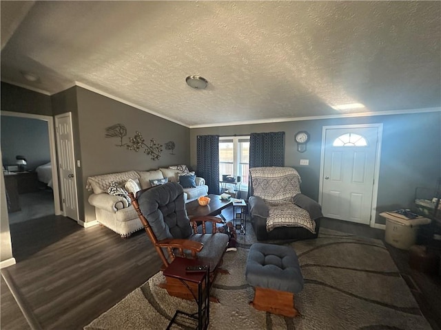 living area with crown molding, a textured ceiling, baseboards, and wood finished floors