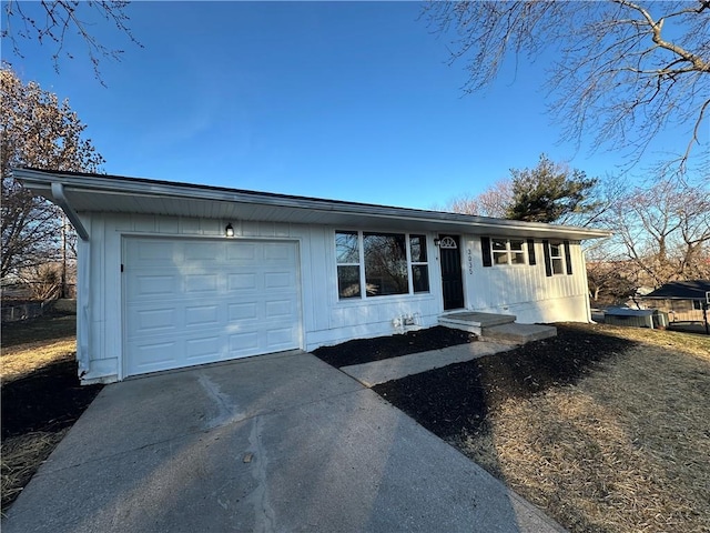 view of front of house featuring driveway and an attached garage