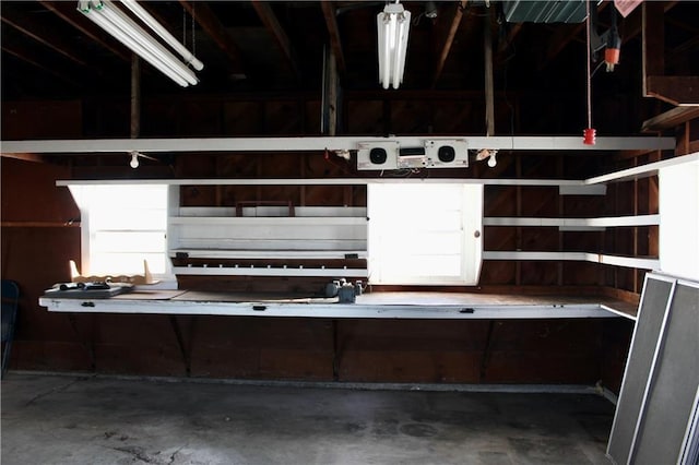 interior details featuring unfinished concrete floors