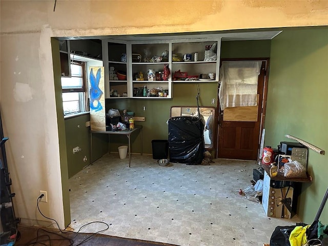 interior space with tile patterned floors