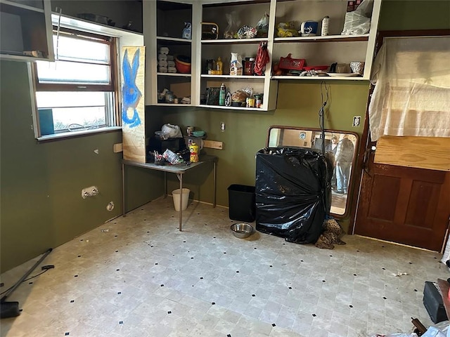 laundry area featuring tile patterned floors