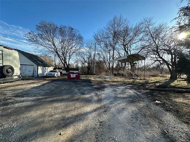 view of road featuring gravel driveway