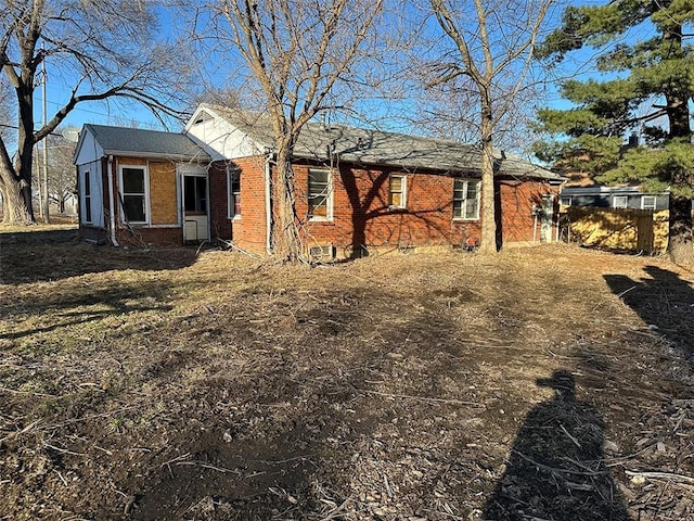 view of front of home with brick siding