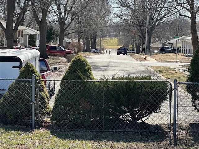 view of yard featuring a gate and fence