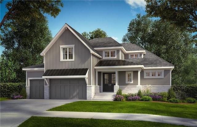 view of front of home featuring stone siding, metal roof, an attached garage, a standing seam roof, and a front lawn