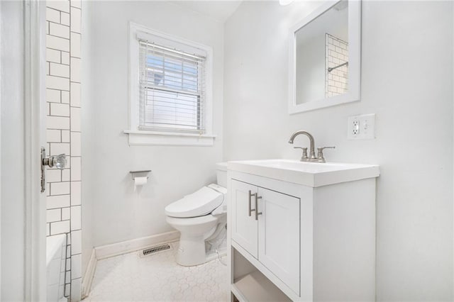 bathroom with baseboards, visible vents, a shower, toilet, and vanity