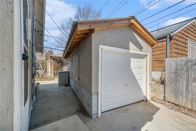 detached garage with fence