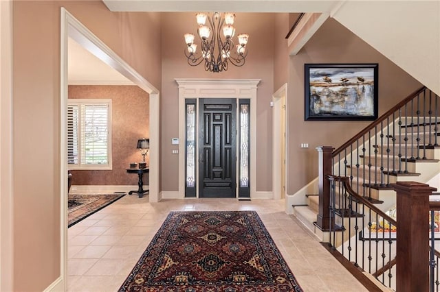 entryway with stairs, light tile patterned flooring, baseboards, and an inviting chandelier