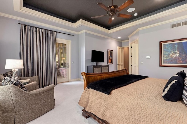 bedroom with visible vents, crown molding, access to outside, light carpet, and a tray ceiling