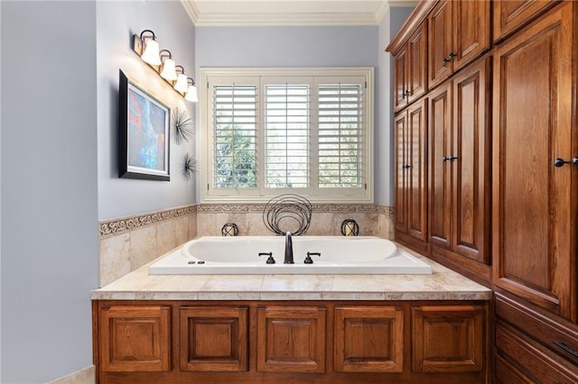 bathroom featuring ornamental molding and a garden tub
