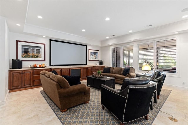 cinema room featuring crown molding, recessed lighting, and baseboards