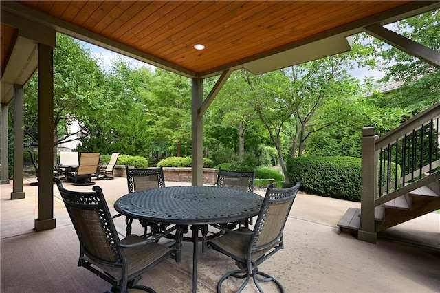 view of patio featuring outdoor dining area