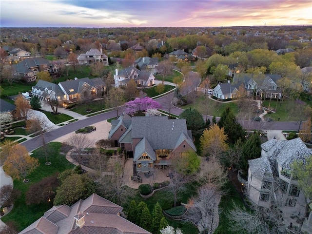 birds eye view of property with a residential view