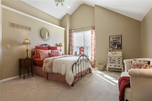 carpeted bedroom featuring baseboards, visible vents, and high vaulted ceiling