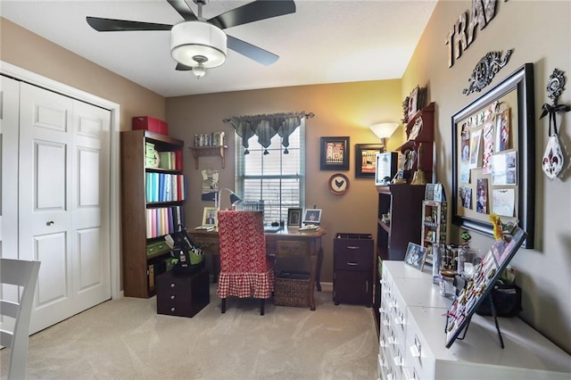 home office with light colored carpet and ceiling fan