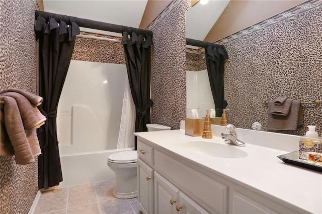 full bath featuring tile patterned floors, shower / tub combo, toilet, and vanity