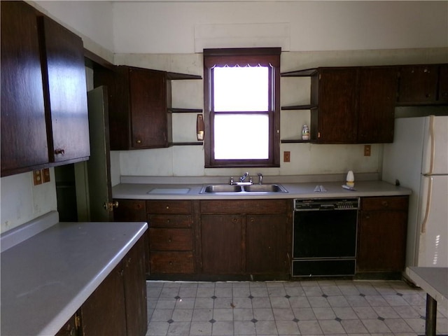 kitchen with open shelves, black dishwasher, light countertops, and a sink