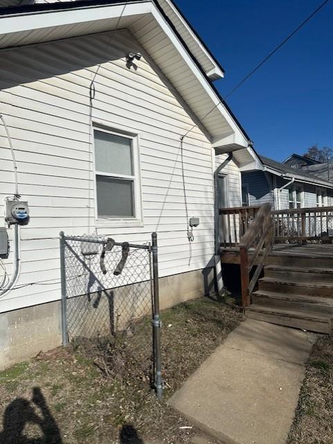 view of home's exterior featuring a deck