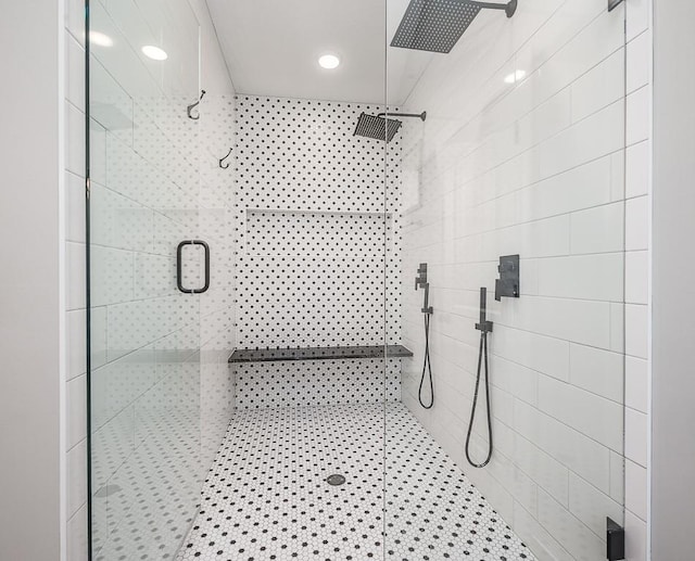 bathroom with a shower stall