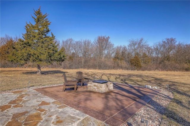 exterior space with an outdoor fire pit